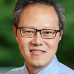 Headshot of a male doctor smiling