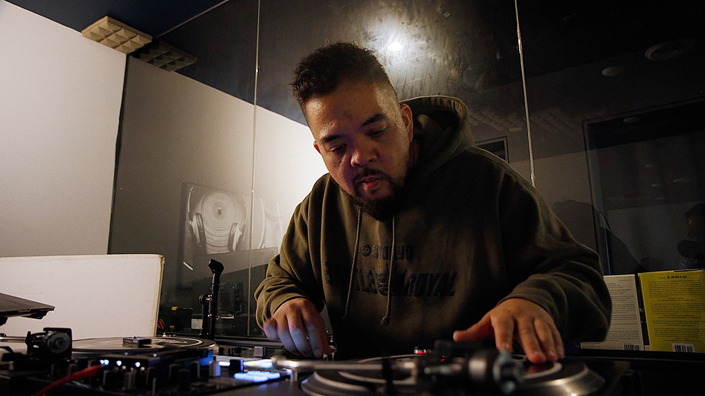 Jonathan Cruz, AKA DJ Shortkut, at his turntable
