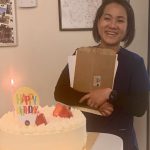 Medical Assistant Linh Tran celebrates her birthday at work with a cake.