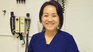 Medical Assistant Linh Tran in an exam room