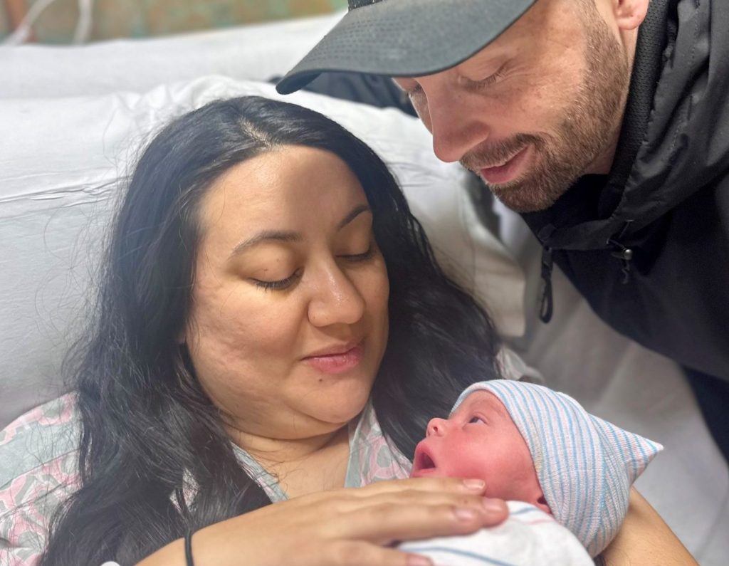 Newborn Conner with parents Shane and Marisa Kerr