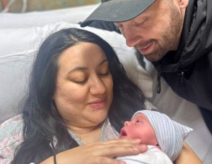 Newborn Conner with parents Shane and Marisa Kerr
