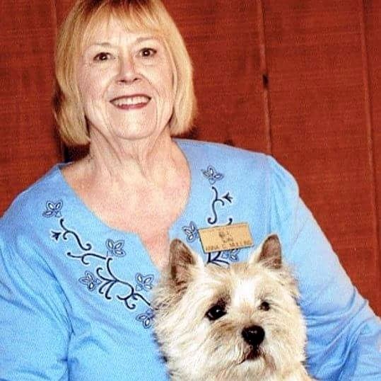 An older woman with a terrier