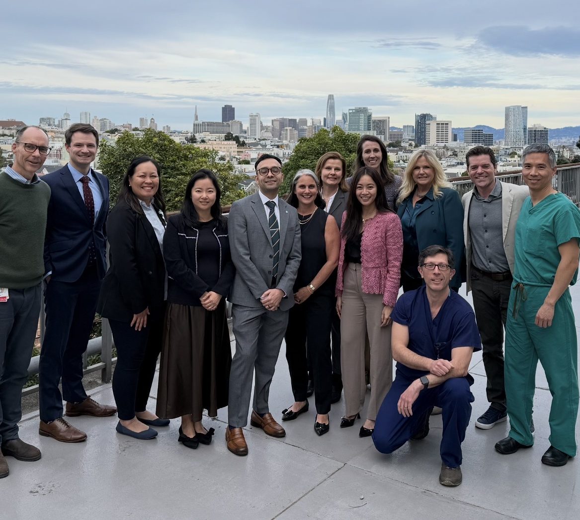 CPMC Davies Campus stroke leadership Group of people stand with the San Francisco city skyline in the background
