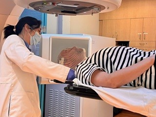 A man getting prepped for radiation