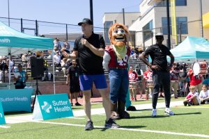 Steve Young and Jerry Rice attend Forever Young flag football camp
