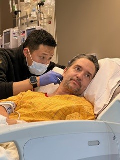 A surgeon checks a patient's head
