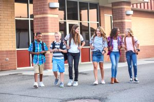 kids headed out of a school building together