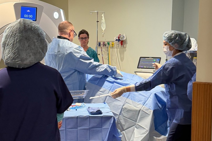 A surgical team works inside an MRI suite during Sutter Health’s first TULSA-PRO® procedure.