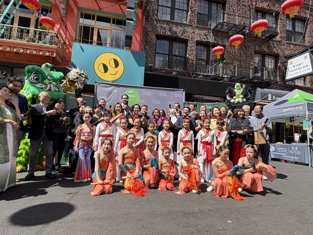 A large group poses in San Francisco's Chinatown