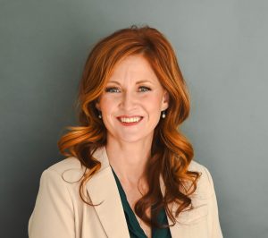 professional woman with red hair